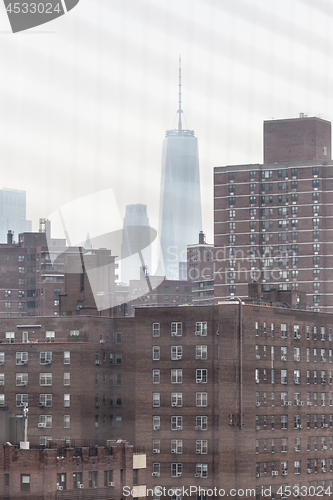 Image of New York Chinatown district and lower manhattan offices on the becakground