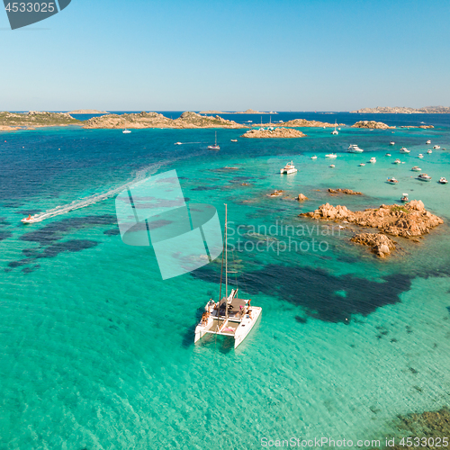 Image of Drone aerial view of catamaran sailing boat in Maddalena Archipelago, Sardinia, Italy.