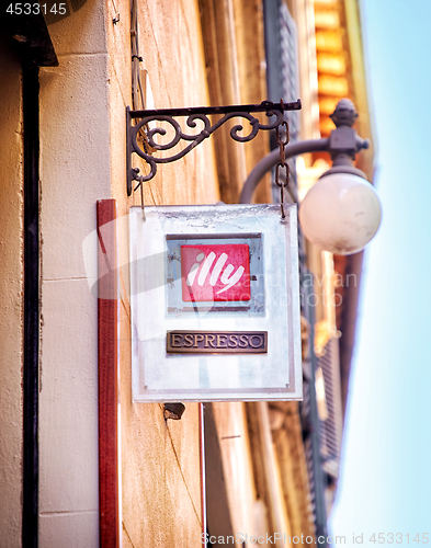 Image of Signboard of coffee Illy in Montepulciano