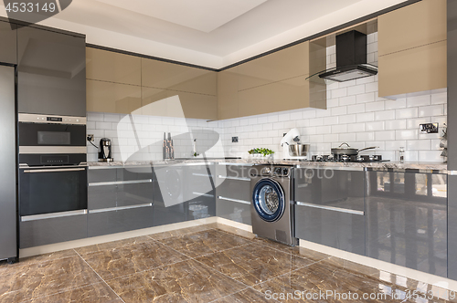 Image of Luxury modern white, beige and grey kitchen interior