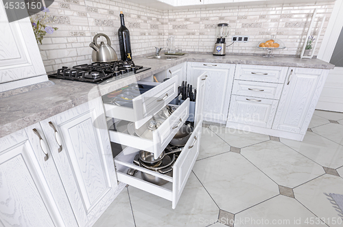 Image of modern white wooden kitchen interior