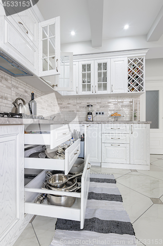 Image of modern white wooden kitchen interior