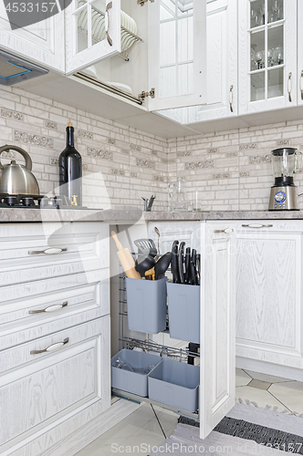 Image of modern white wooden kitchen interior