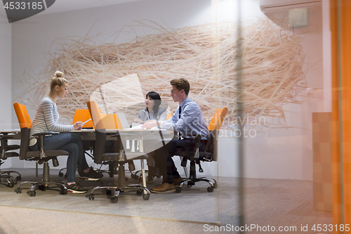 Image of Business Team At A Meeting at modern office building