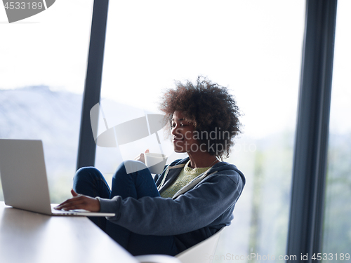 Image of African American woman in the living room