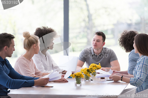 Image of Multiethnic startup business team on meeting