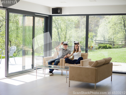 Image of Couple using virtual reality headset