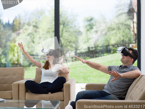 Image of Couple using virtual reality headset