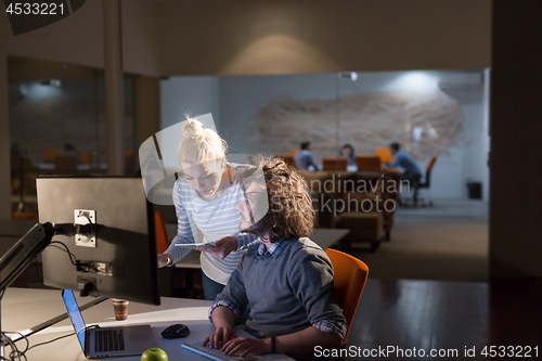 Image of young designers in the night office