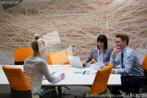 Image of Business Team At A Meeting at modern office building