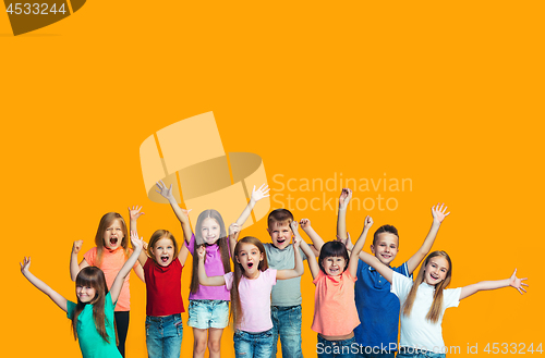 Image of Happy success teensl celebrating being a winner. Dynamic energetic image of happy children