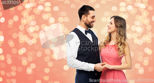 Image of happy couple in party clothes