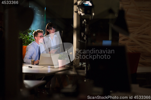 Image of young designers in the night office