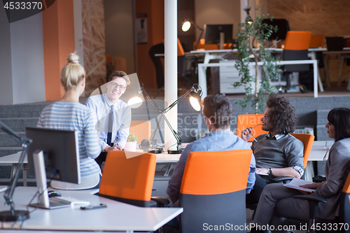Image of Young Business Team At A Meeting at modern office building