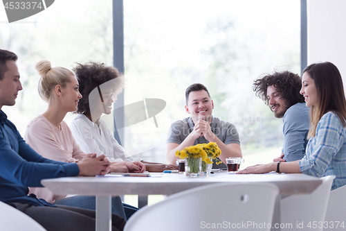 Image of Multiethnic startup Business Team At A Meeting at modern office 