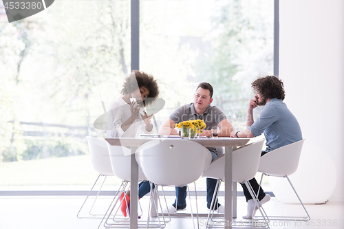 Image of Multiethnic startup business team on meeting