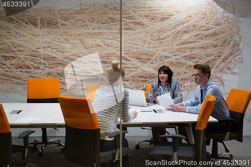 Image of Business Team At A Meeting at modern office building