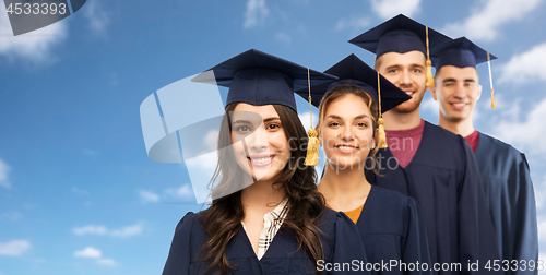 Image of graduates in mortar boards and bachelor gowns