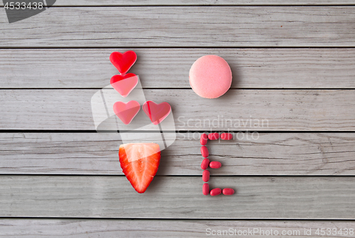 Image of close up of word love made of sweets