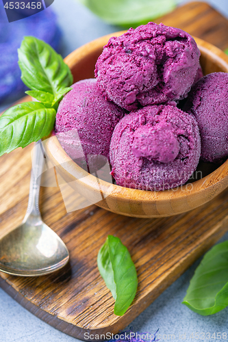 Image of Bowl of homemade blueberry ice cream.
