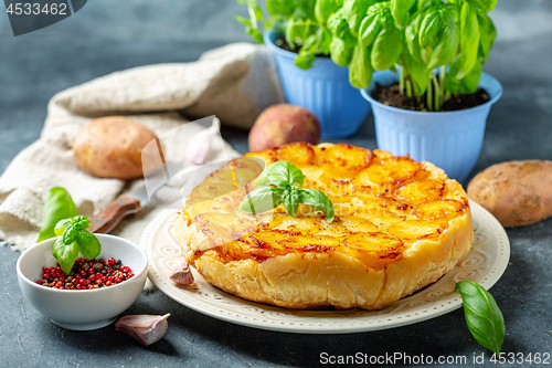 Image of Homemade Tarte Tatin with potatoes.