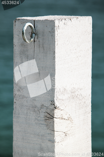 Image of White wooden post
