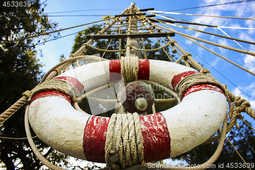 Image of Lifebelt on the wooden mast