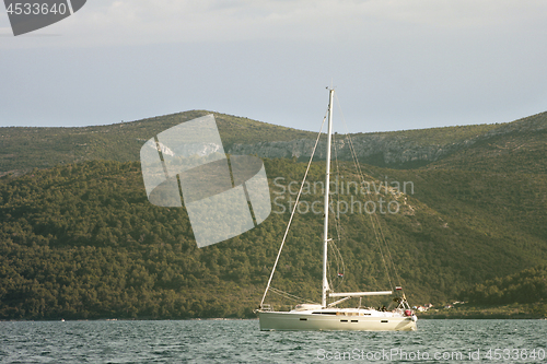 Image of Sailing boat returns to the harbor