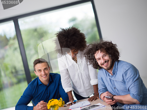 Image of Multiethnic startup Business Team At A Meeting at modern office 