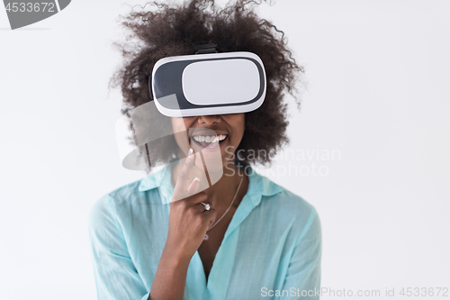 Image of black girl using VR headset glasses of virtual reality