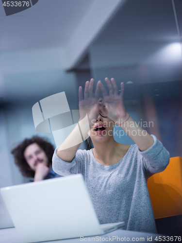 Image of Startup Business Team At A Meeting at modern night office buildi