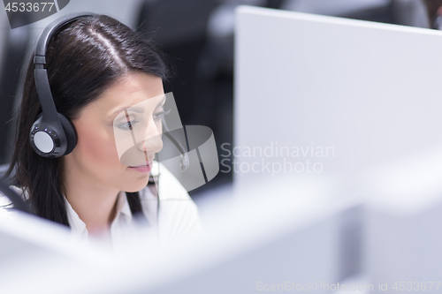 Image of female call centre operator doing her job