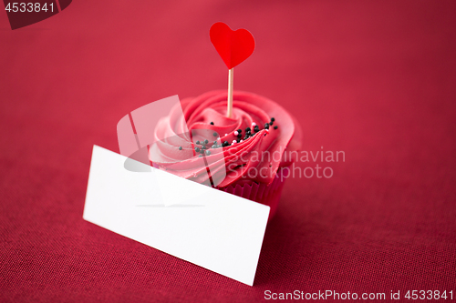 Image of cupcake with heart cocktail stick and nametag