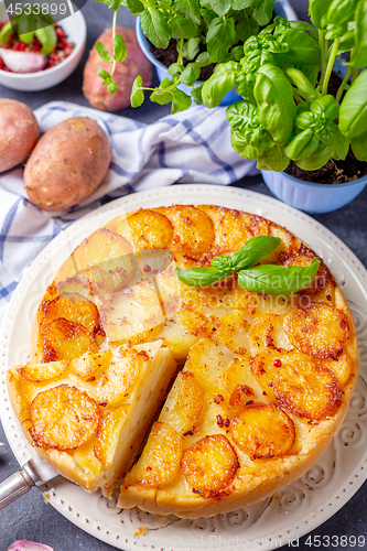 Image of Sliced traditional potato pie.