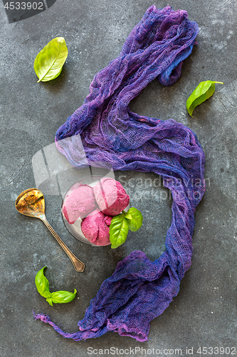 Image of Homemade blueberry ice cream with basil.