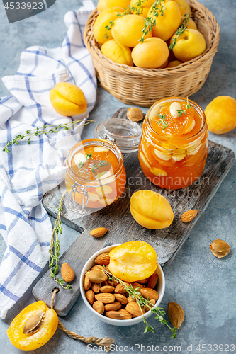 Image of Delicious apricot jam with thyme and almonds.