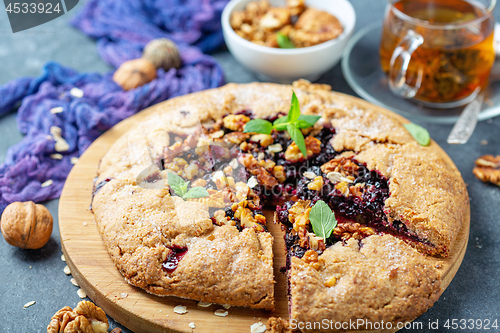 Image of Cut Galette pie with black currant.