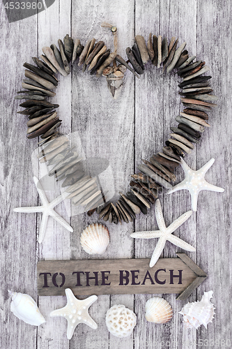 Image of Driftwood Heart and to the Beach Sign