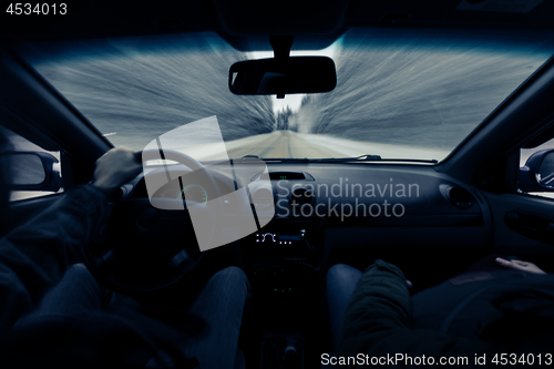 Image of driving a car on winter road