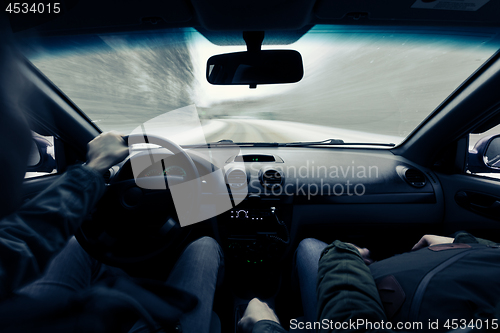 Image of driving a car on winter road