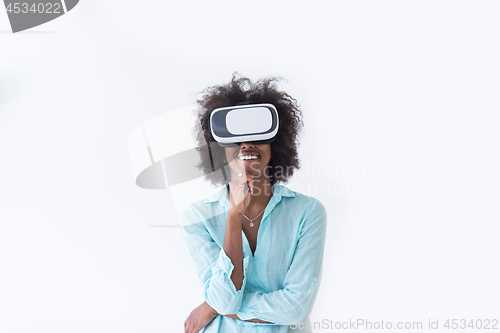 Image of black girl using VR headset glasses of virtual reality