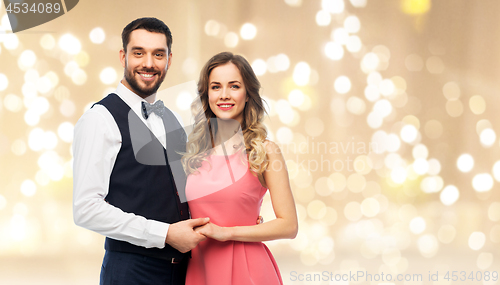 Image of happy couple in party clothes