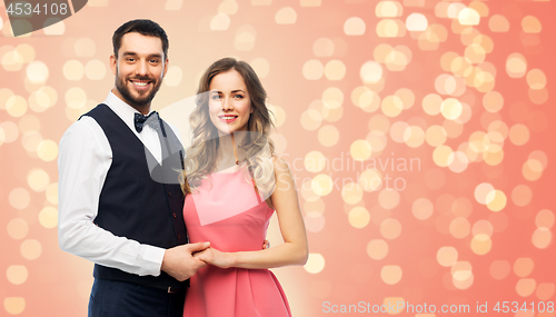 Image of happy couple in party clothes