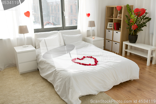 Image of cozy bedroom decorated for valentines day