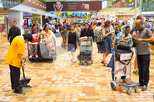 Image of Busy Changi airport hall. Singapore