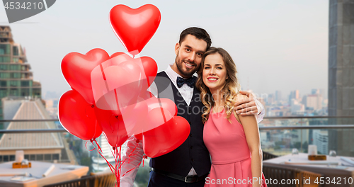 Image of couple with heart shaped balloons in singapore