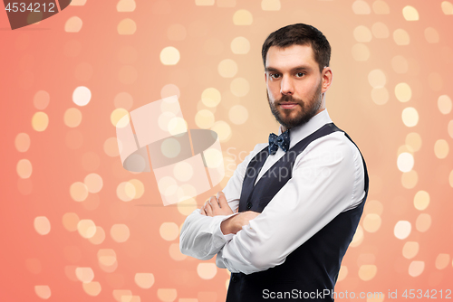 Image of man in party clothes and bowtie