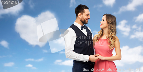 Image of happy couple in party clothes