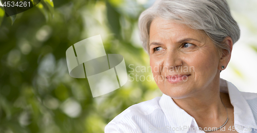 Image of portrait of smiling senior woman