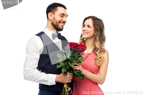 Image of couple with bunch of flowers on valentines day